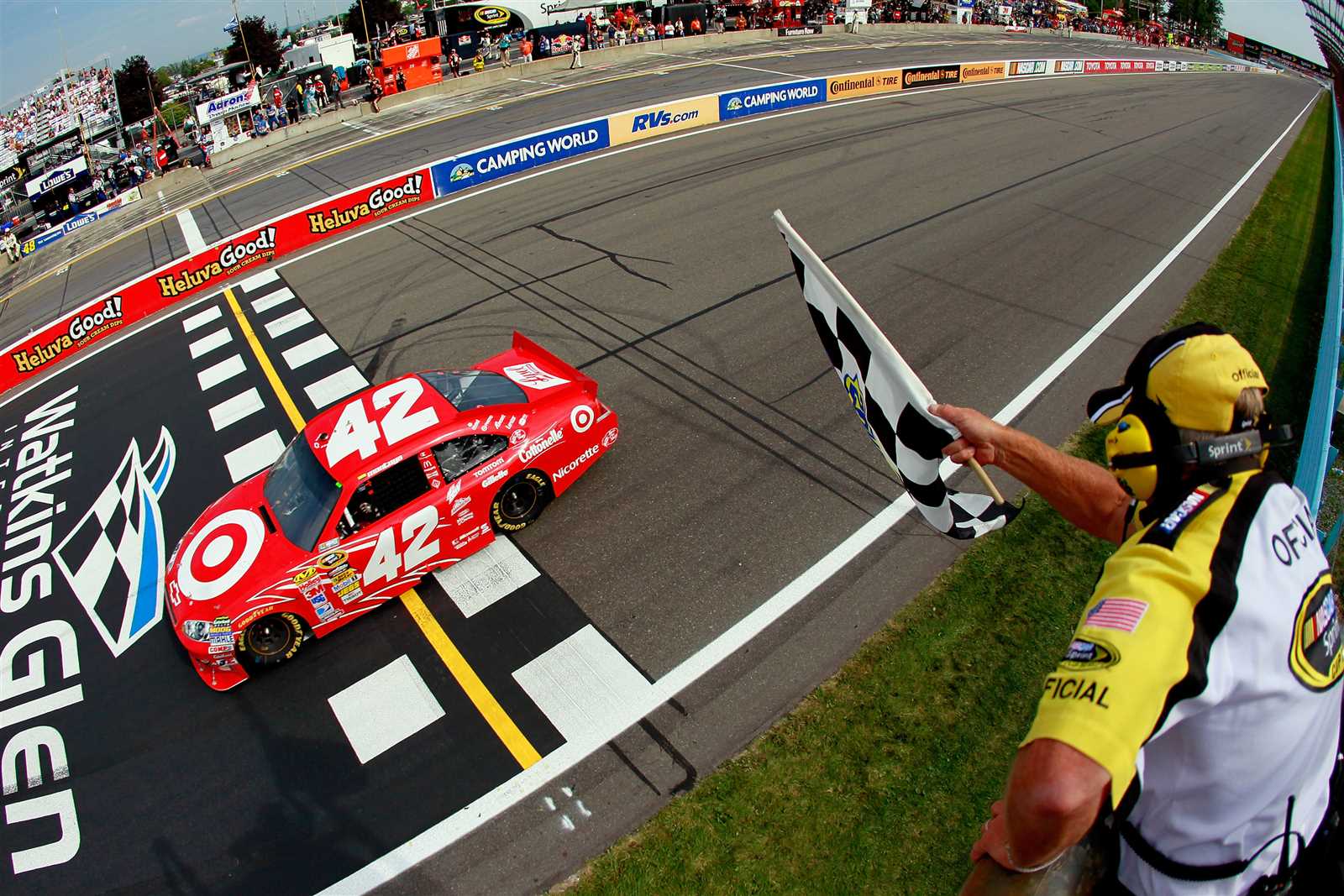 <p><u>Aug. 8, 2010</u><br />Juan Pablo Montoya crosses the finish line directly below the checkered flag to win the Heluva Good! Sour Cream Dips at the Glen Cup Series race at Watkins Glen International. Montoya's second win in the series gave him the career sweep at the two road courses on the schedule.</p>