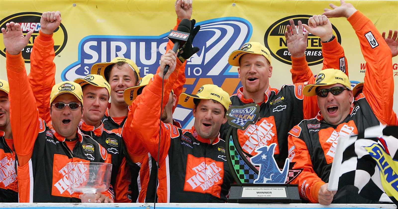 <p><u>Aug. 14, 2005</u><br />Tony Stewart and the No. 20 The Home Depot Chevrolet crew celebrate their fifth victory in seven races after winning the Sirius Satellite Radio at the Glen in Victory Lane at Watkins Glen International. Stewart set a track record for the most laps led by a race winner.</p>