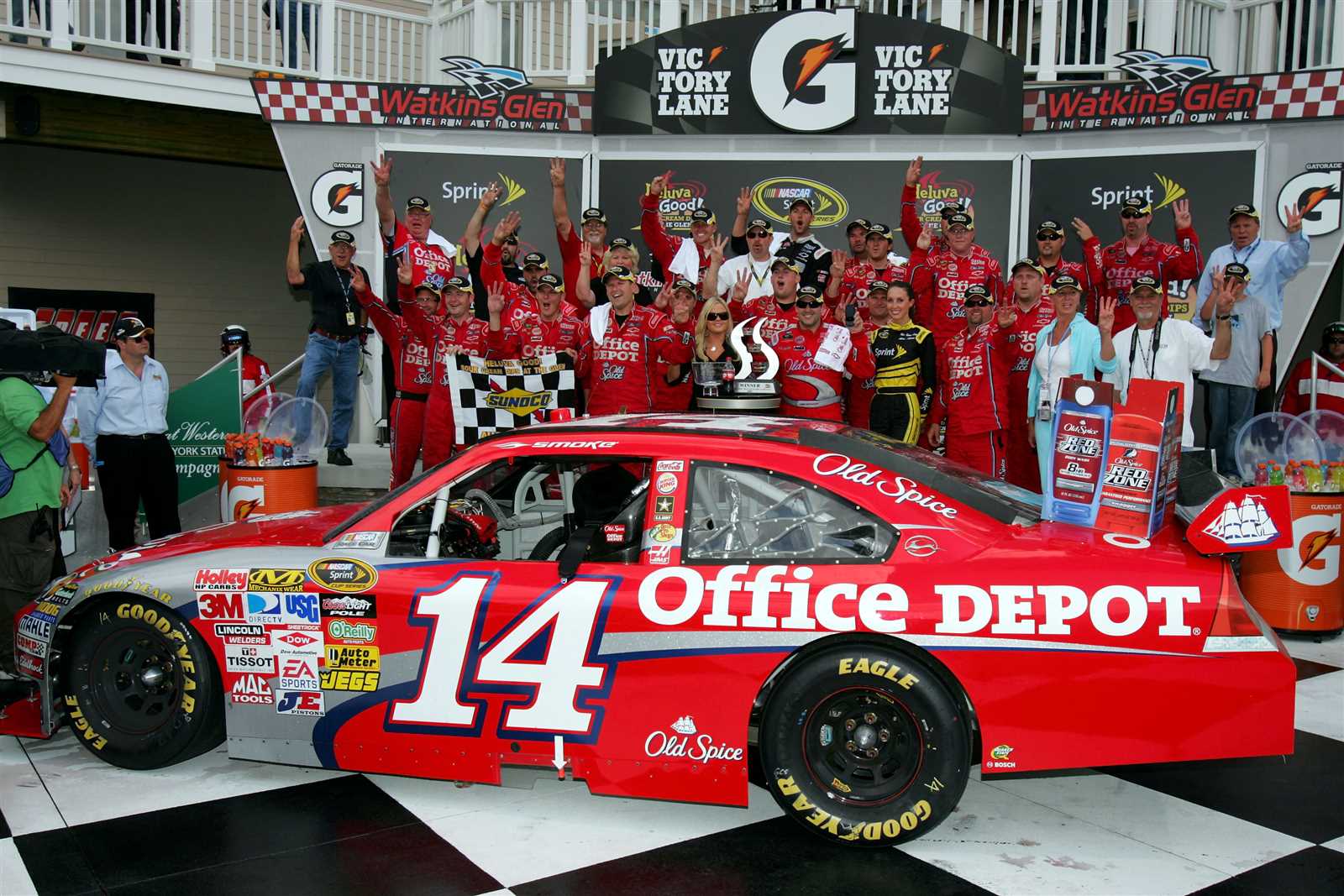 <p><u>Aug. 10, 2009</u><br />Tony Stewart, driver of the No. 14 Old Spice/Office Depot Chevrolet, celebrates in Victory Lane after winning the Heluva Good! Sour Cream Dips at Watkins Glen International. The victory gave Stewart a record five wins at the New York road course.</p>